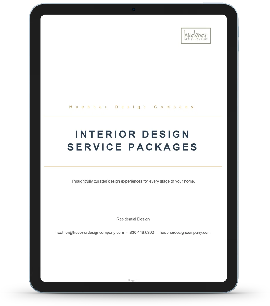 A tablet displays a document titled "Interior Design Service Packages" by Huebner Design Company, with contact information and a brief description of residential design services.